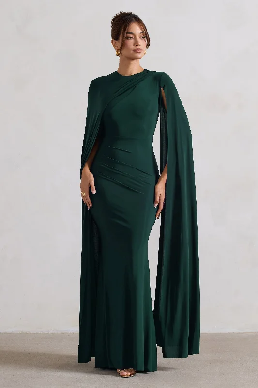 Maxi dresses for a stylish destination wedding at a luxury resort -Magdelena | Bottle Green Asymmetric Cape Maxi Dress